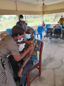 DCE Of South Dayi District Takes First COVID-19 Jab.